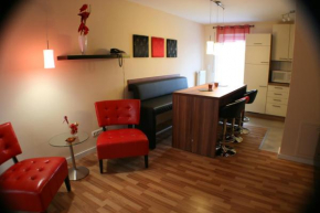 Отель Ferienwohnung Weinberg  Митель-Грюндау